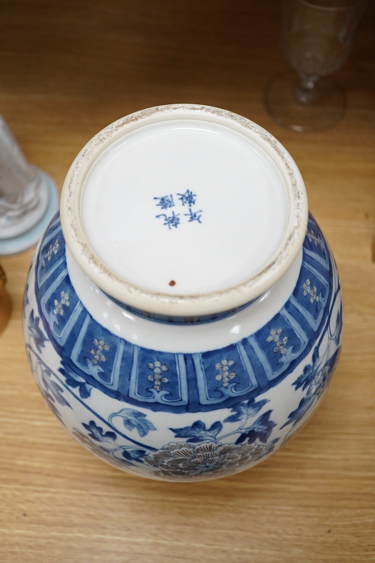 A Chinese underglaze blue and copper red baluster vase, 32cm high